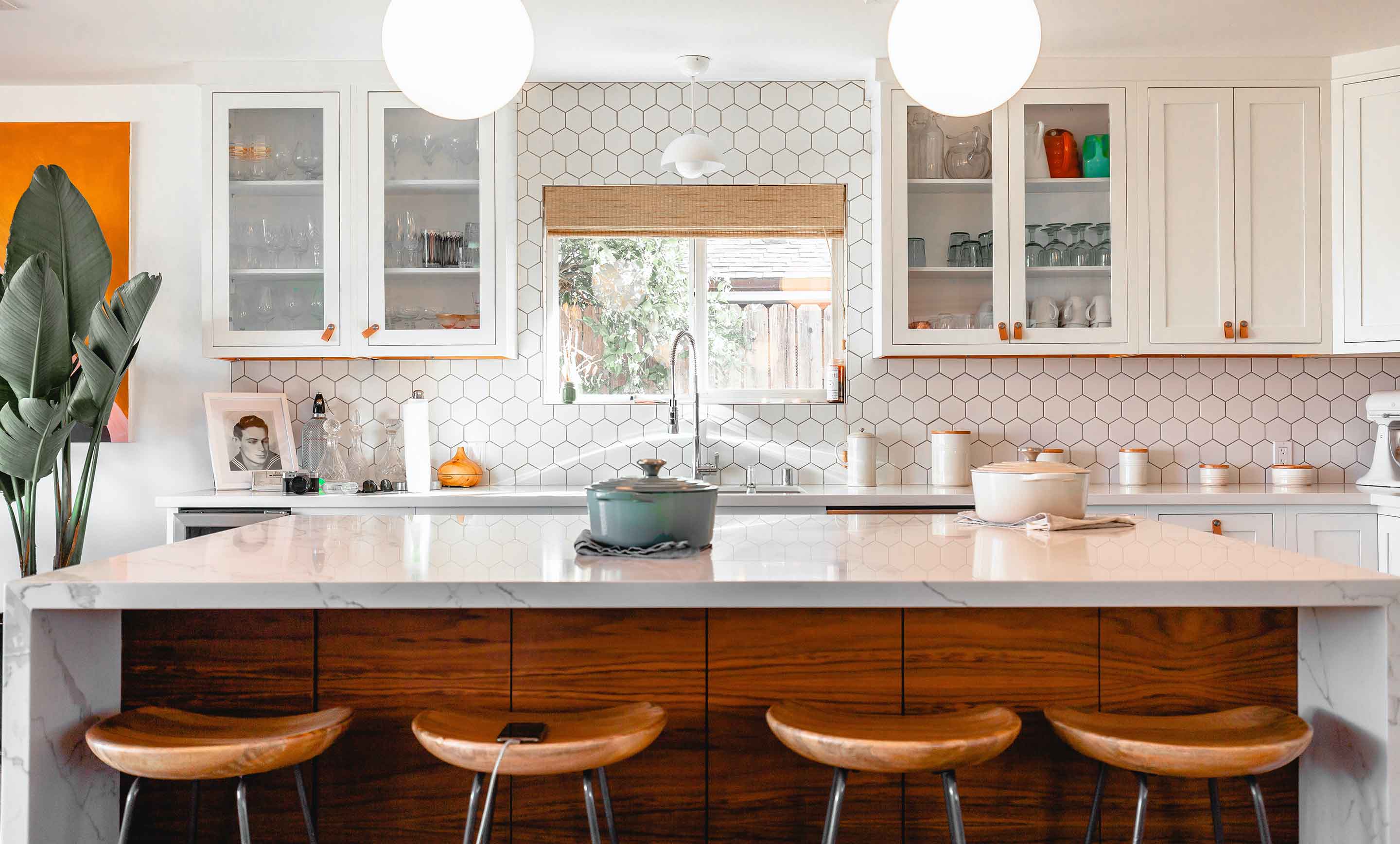 A modern kitchen with clean lines and hexagonal background tile, compressed by Photoshop at 2x scale. The detail lines are crisp on retina screens.